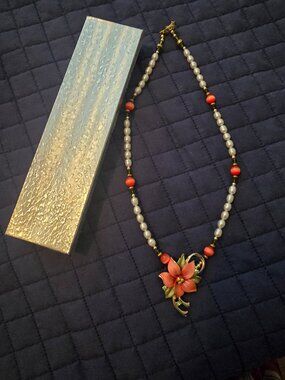 Beautiful orange orchid necklace